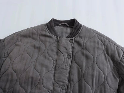 Padded bomber jacket that combines warmth and style | Elara