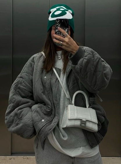 Padded bomber jacket that combines warmth and style | Elara