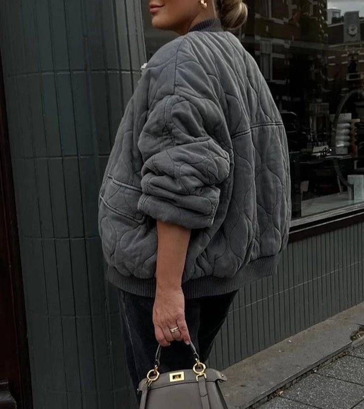 Padded bomber jacket that combines warmth and style | Elara