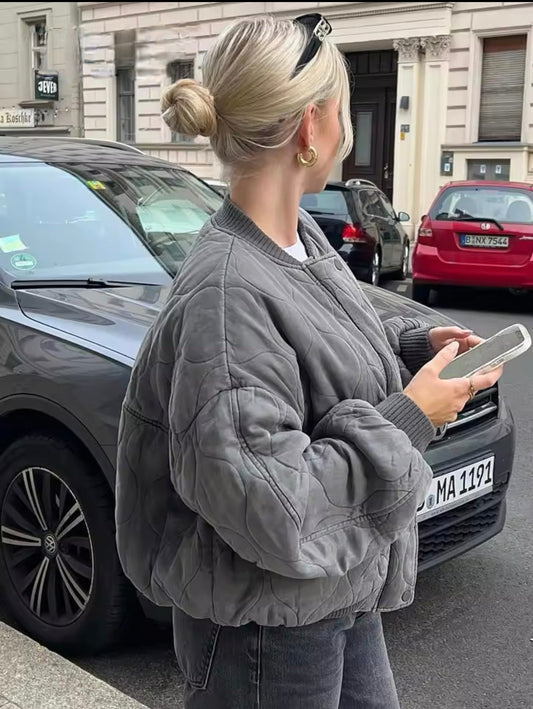 Padded bomber jacket that combines warmth and style | Elara