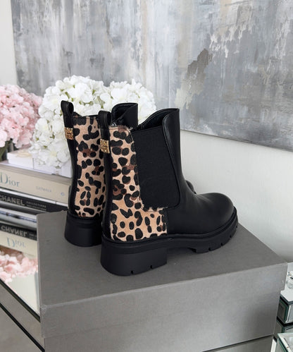 Botas elegantes con estampado de leopardo negro | Fiora